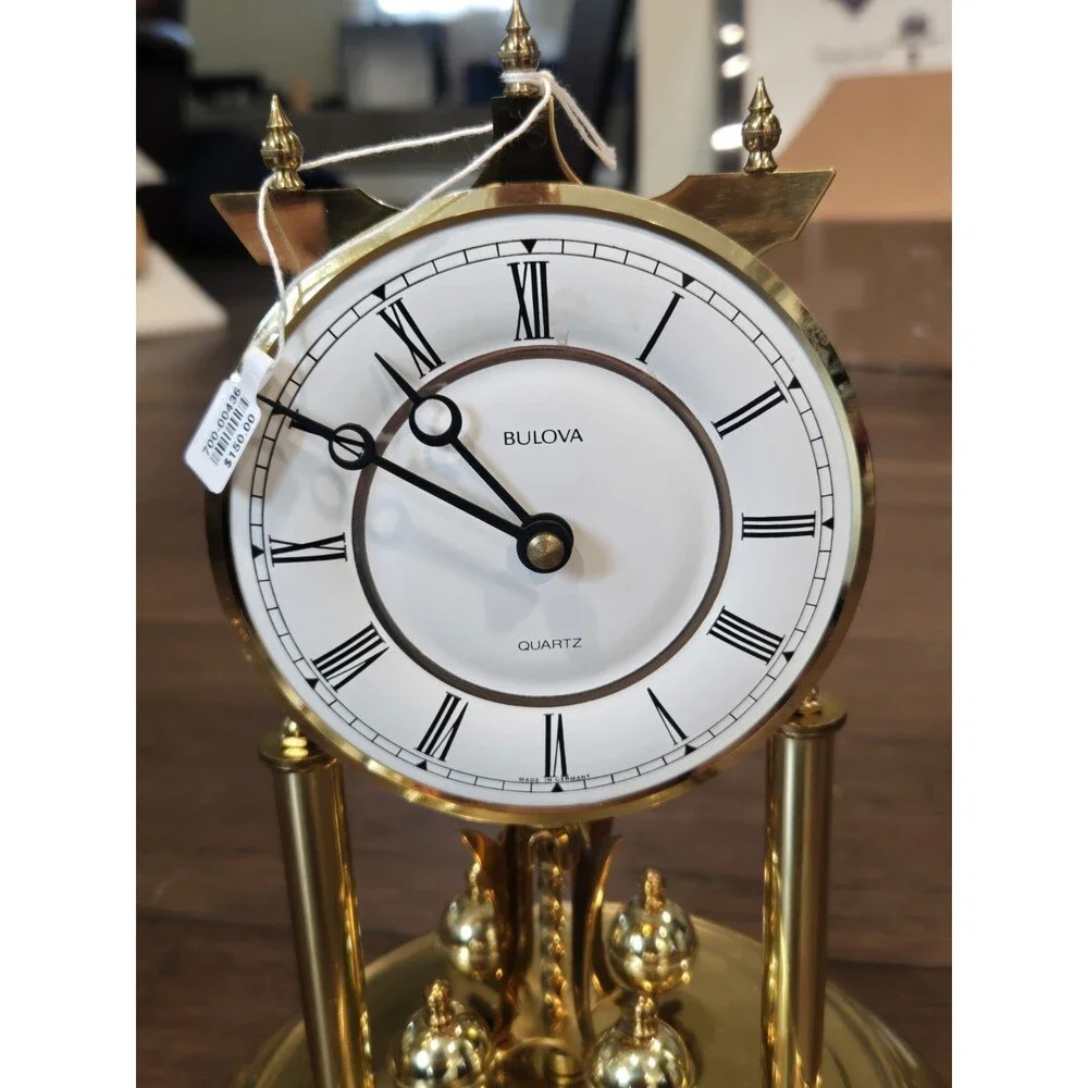 Bulova Tristan I B8818 Anniversary Clock - Glass Dome, Rotating Crystal Pendulum